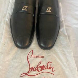 Christian Louboutin
Varsimoc Leather Loafers